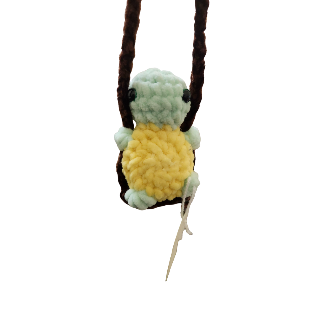 Turtle on a swing
