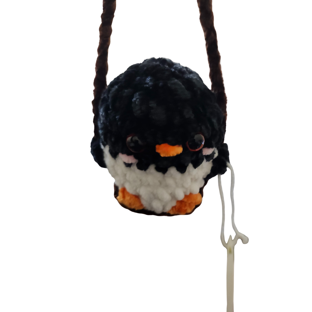 Penguin in a Swing