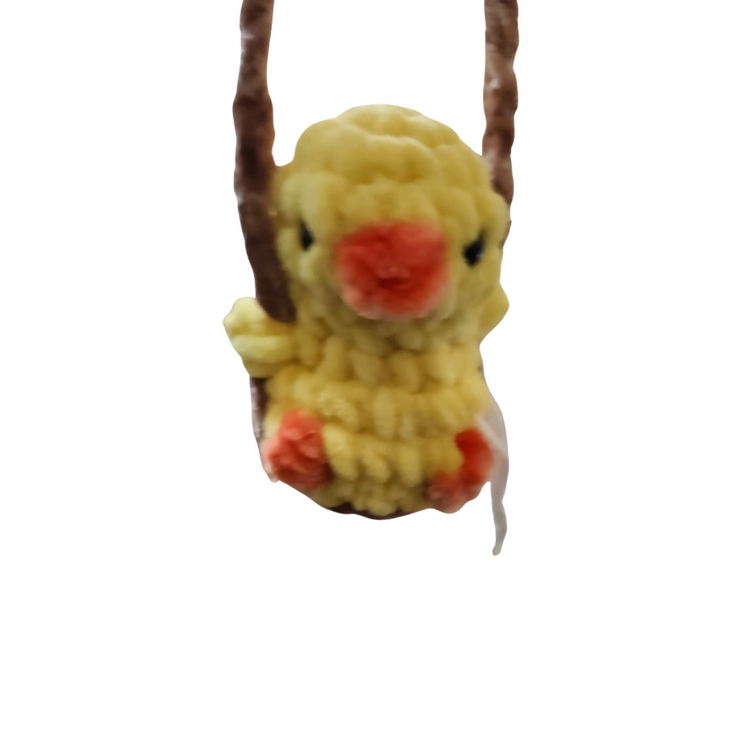 Yellow Bird on a Swing