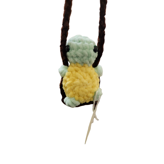 Turtle on a swing