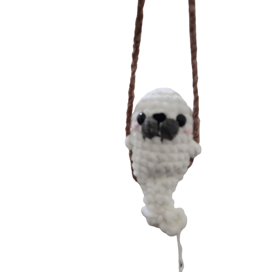 Seal on a swing